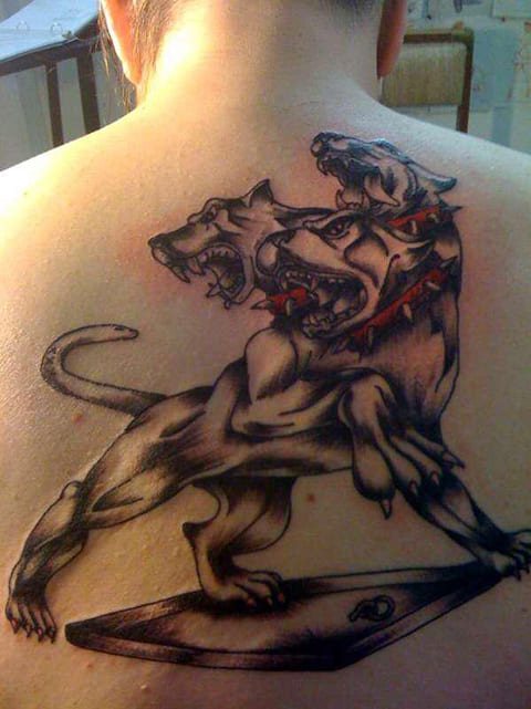 Cerberus tattoo on back