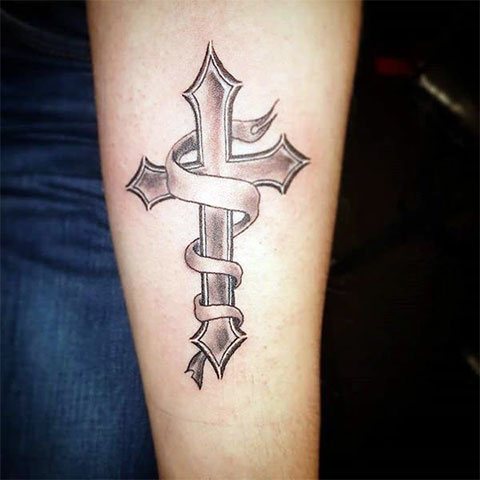 Tattoo black cross on hand
