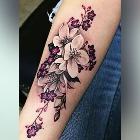 Tattoo Cherry Blossoms on a Girl's Hand