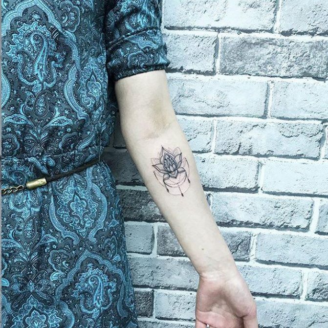tattoo of lotus flower meaning in black graphics