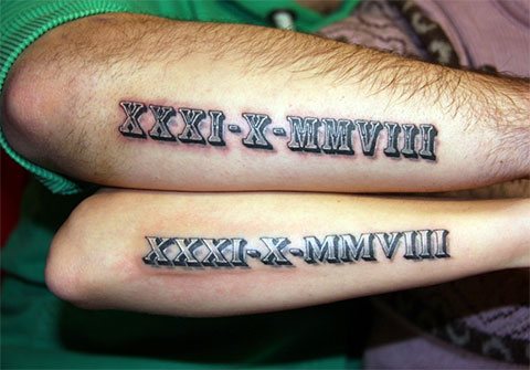 Tattoo child's date of birth in Roman numerals