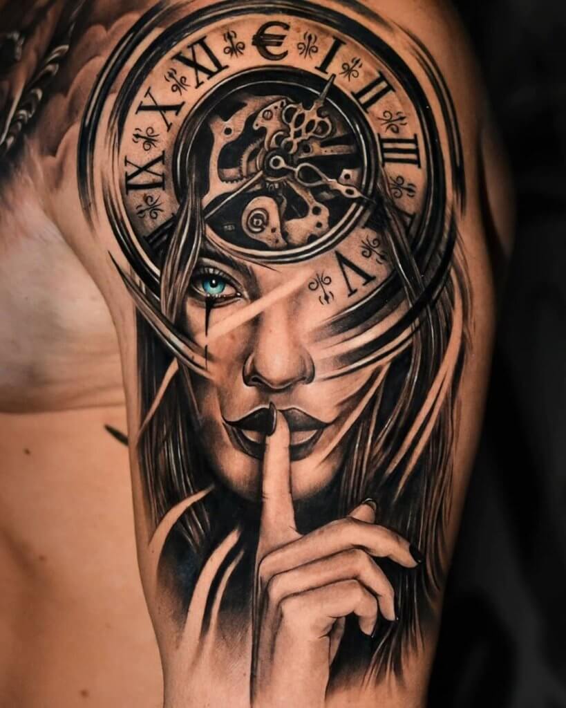 Tattoo girl with a clock on her shoulder