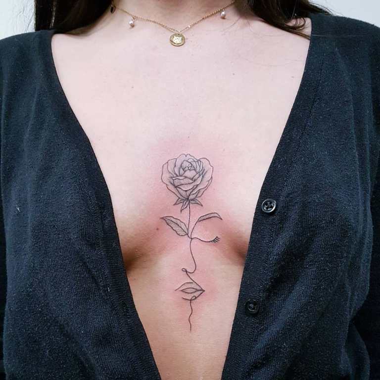 Tattoo for girls near breasts
