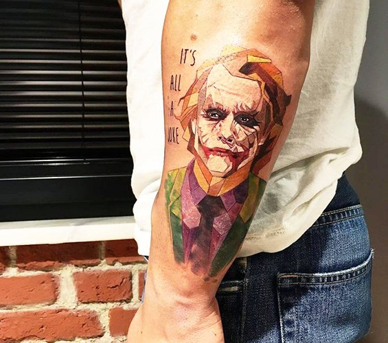 Tattoo Joker on the arm, forearm, leg. Sketches, photo, meaning