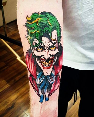 Tattoo Joker on his arm, forearm, leg. Sketches, photo, meaning