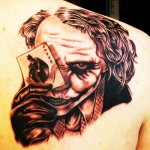 Tattoo Joker on the arm, forearm, leg. Sketches, photo, meaning