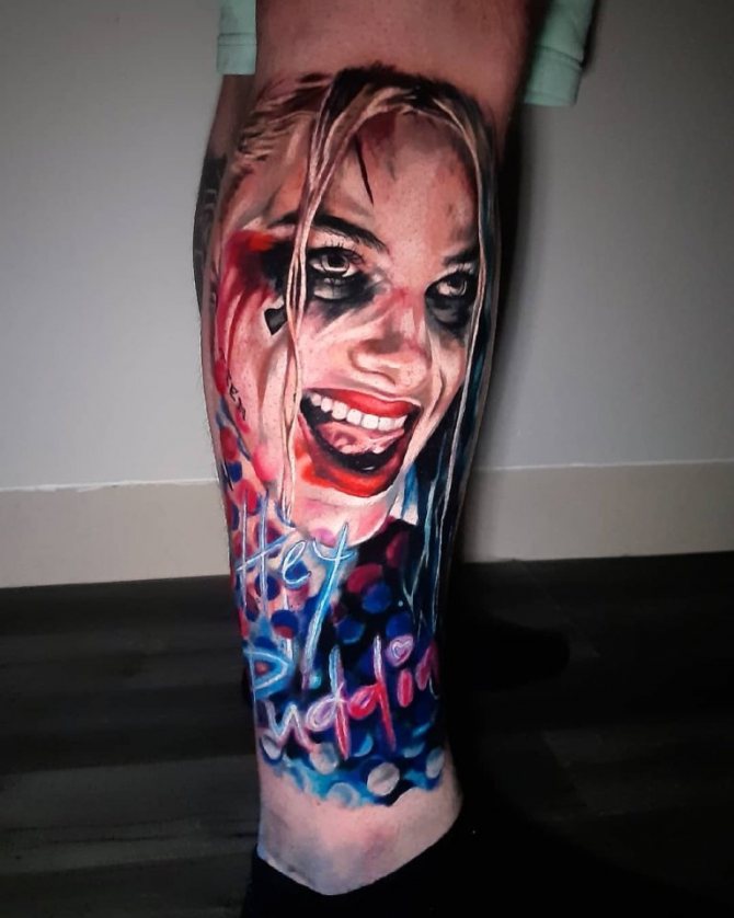 Tattoo of a joker on his arm
