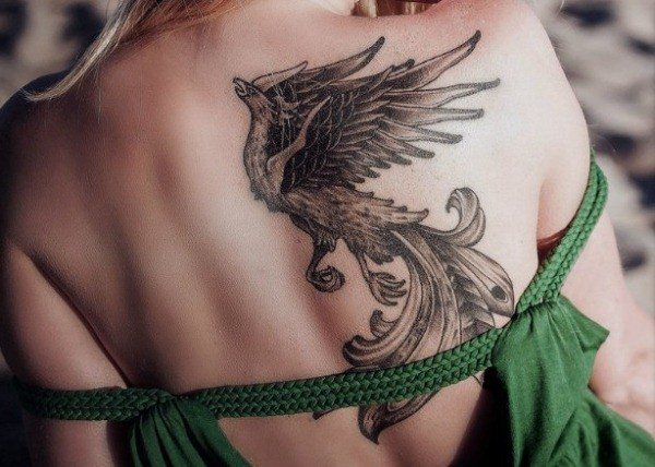 Tattoo phoenix on girls back