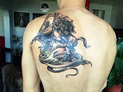 Tattoo of Saint George the Victorious on the shoulder blade