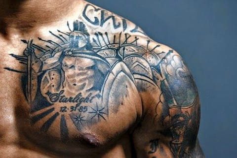 Tattoo of an gladiator on the shoulder and chest
