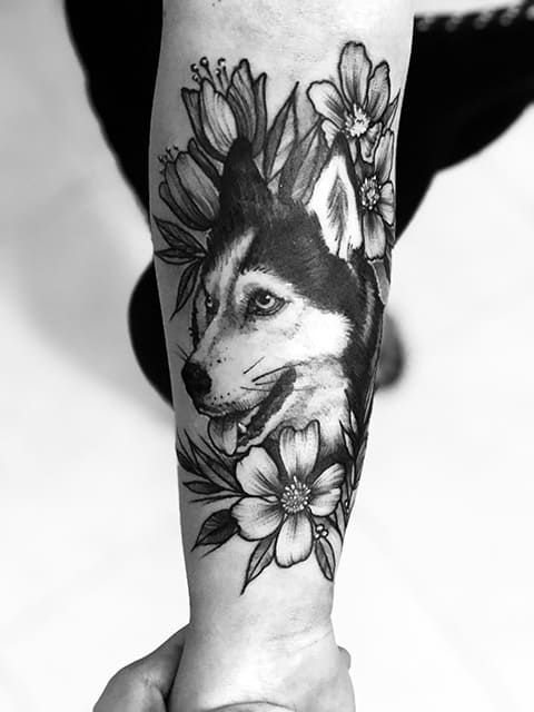 Husky tattoo in flowers