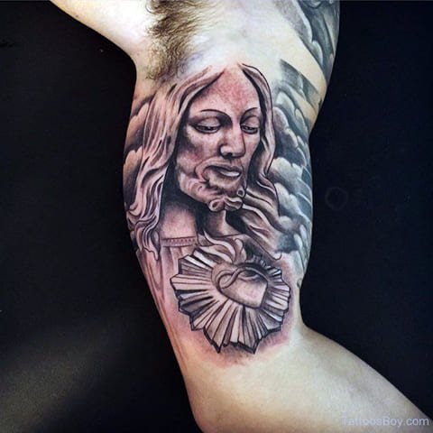 Tattoo Jesus Christ on his arm