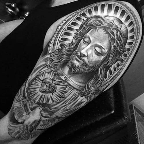 Tattoo of Jesus on arm, back, shoulder, chest. Meaning, on the cross, with the devil, machine, dove