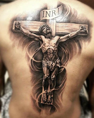 Tattoo Jesus on arm, back, shoulder, sternum. Meaning, on the cross, with the devil, machine, dove