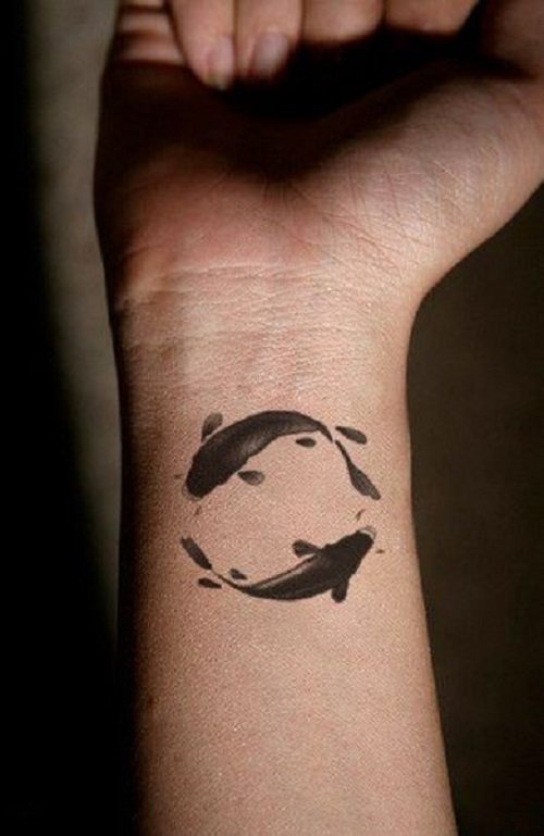 Yin Yang tattoo on hand