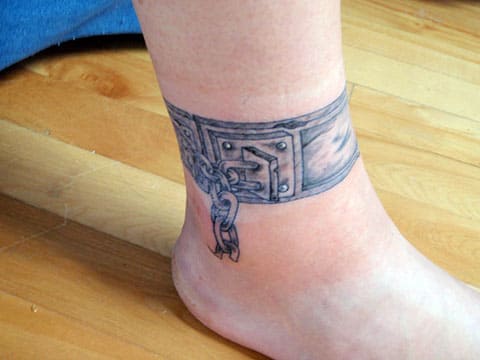 Tattoo shackles on ankle