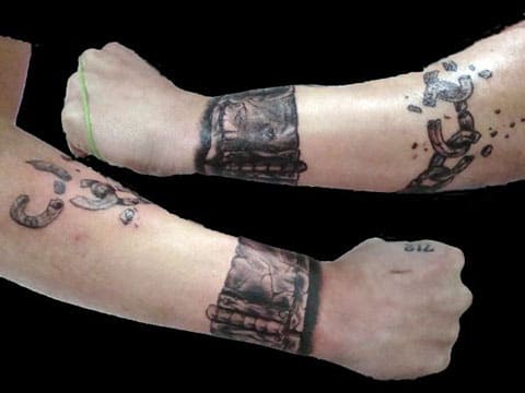 Tattoo shackles on wrist