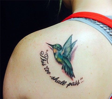 Hummingbird tattoo on the shoulder blade