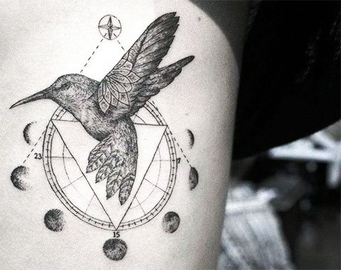 Hummingbird tattoo with elements of geometry