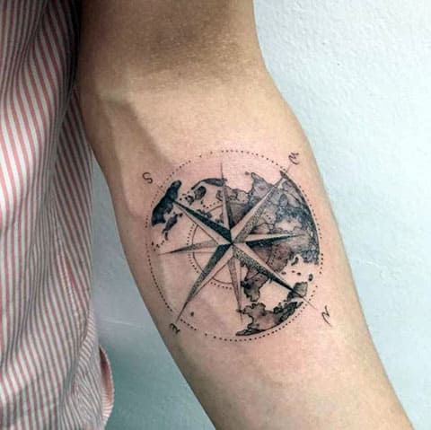 Tattoo compass on hand
