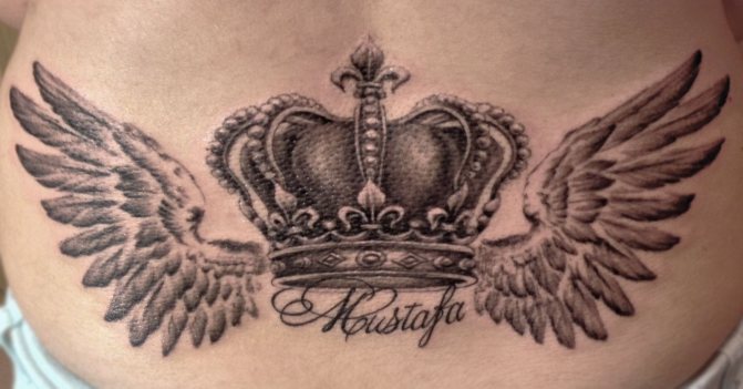 Tattoo of crowns with wings