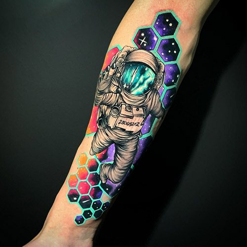 Tattoo Astronaut on your arm. Sketches, meaning, photo