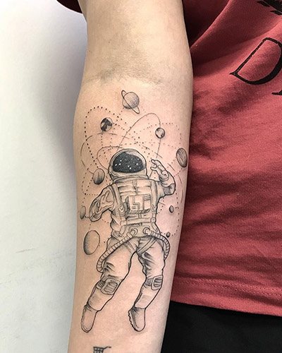 Tattoo Astronaut on your arm. Sketches, meaning, photos