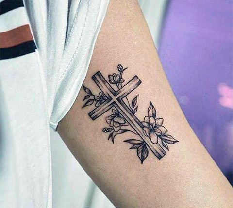 Tattoo cross on hand