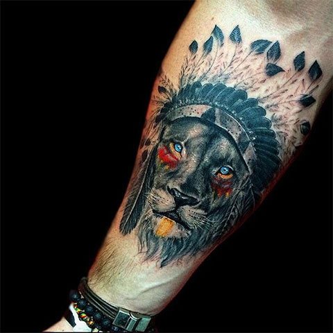 Tattoo of a lion on his arm for men