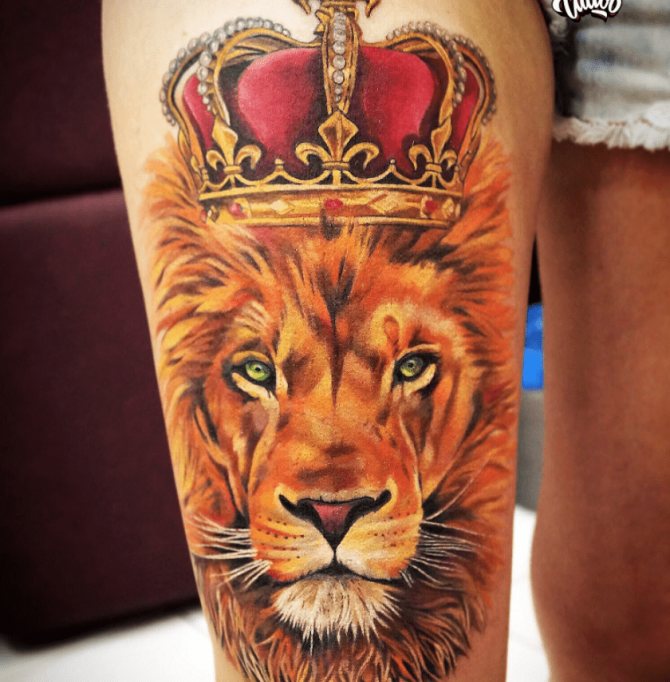 Tattoo of lion in a crown
