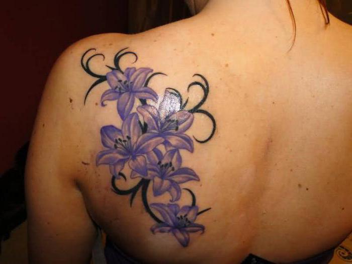 Tattoo of lilies on the shoulder