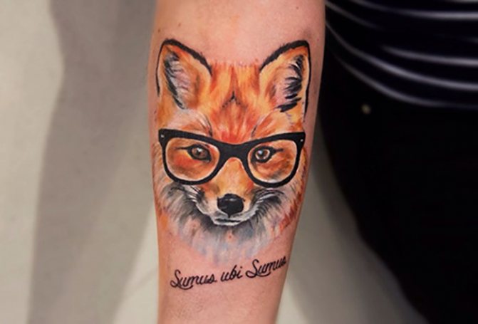 Fox tattoo on the arm with glasses
