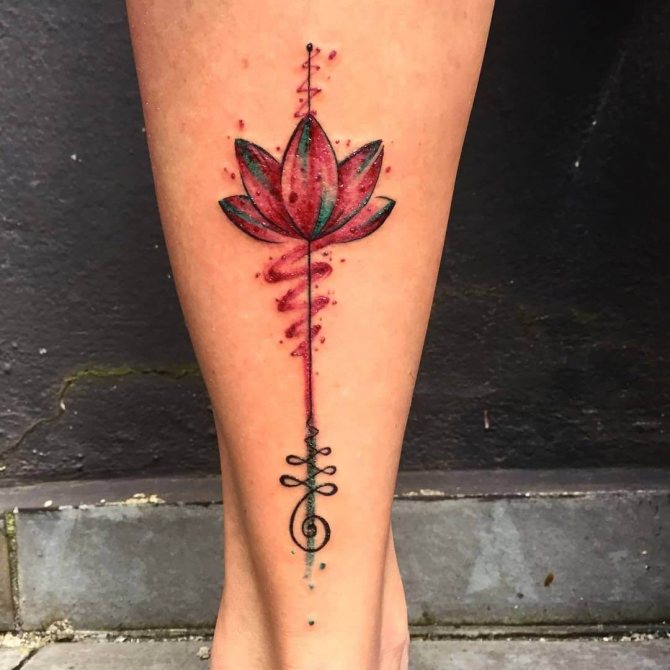tattoo of lotus on his leg