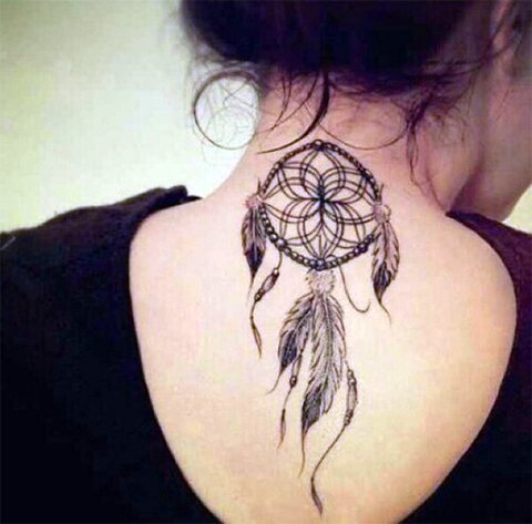 Tattoo of a dream catcher on the neck