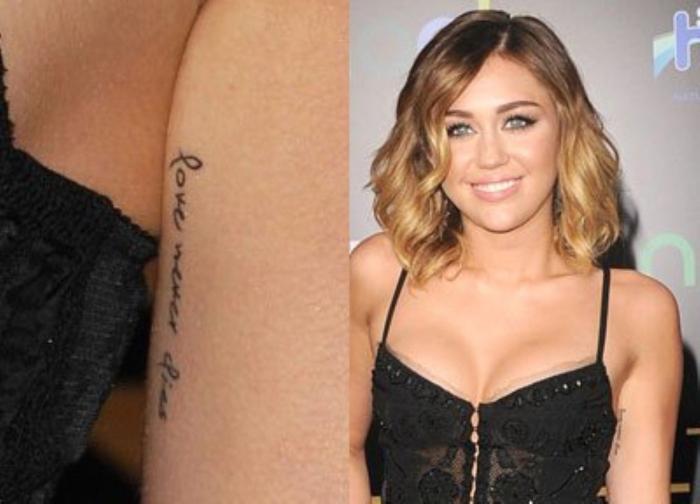Tattoo of Miley Cyrus on her arm