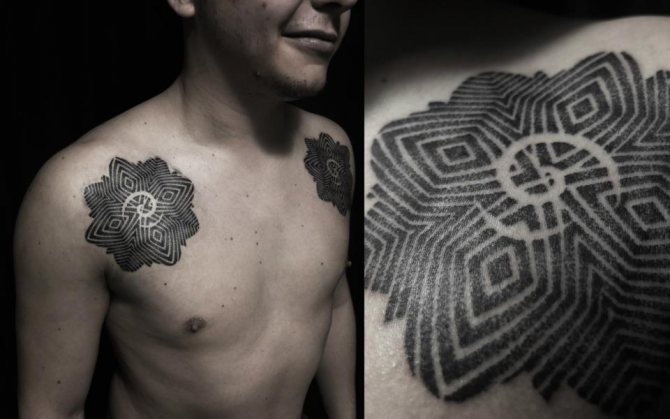 Tattoo mandala on male clavicles