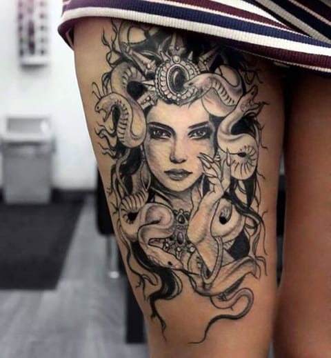 Medusa Gorgon tattoo on a girl's leg