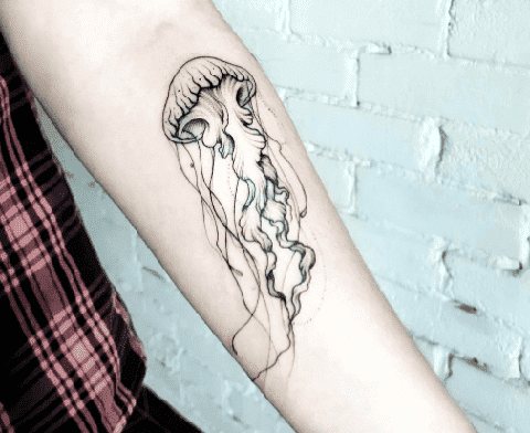 Tattoo jellyfish on hand