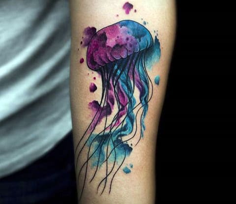 Watercolor jellyfish tattoo on hand
