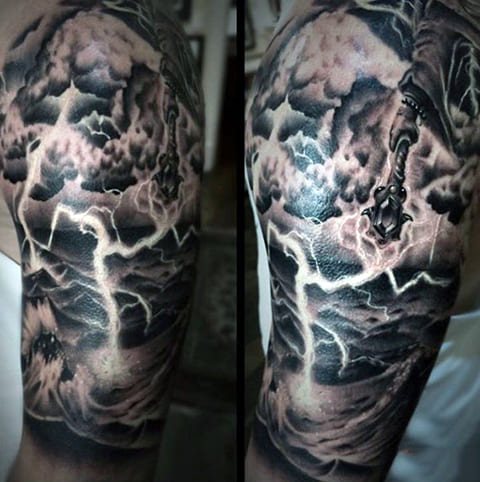 Tattoo Lightning on a Man's Shoulder - photo