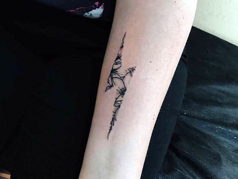 Lightning tattoo on arm