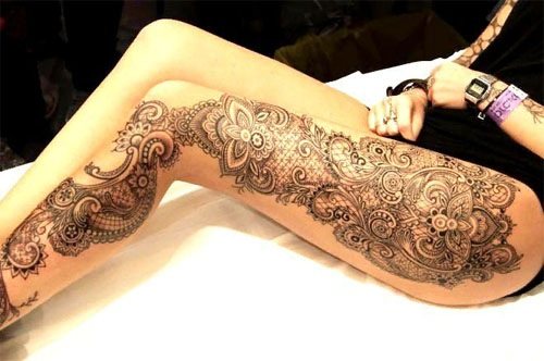 Tattoo on the hip for girls, photo. Beautiful patterns, lace, flowers, sketches, inscriptions with translation