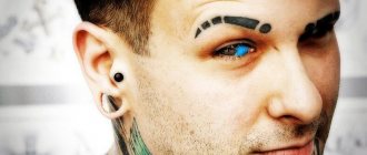 Tattoo on the Eyeball with Blue Ink