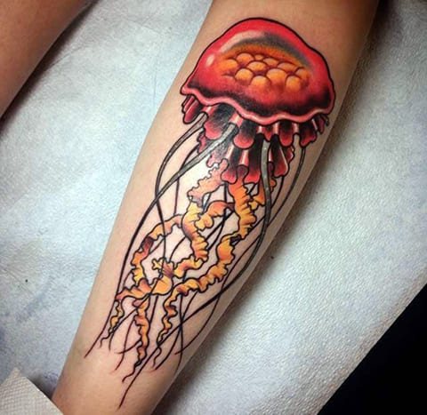 Jellyfish tattoo on his leg