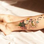Women's foot tattoos