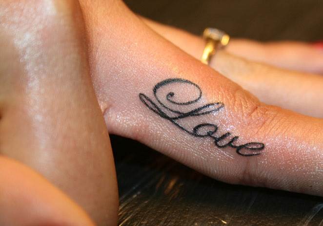 Tattoos on fingers for girls. Inscriptions, designs and their meaning of small tattoos