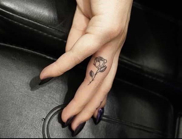 Tattoos on fingers for girls. Inscriptions, sketches and their meaning of small tattoos