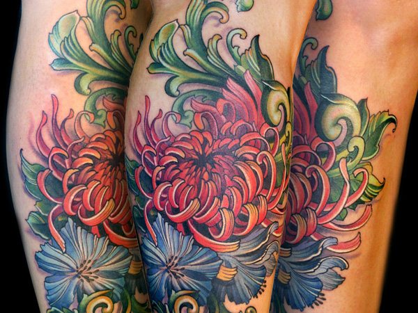 Tattoo on the arm - chrysanthemum.