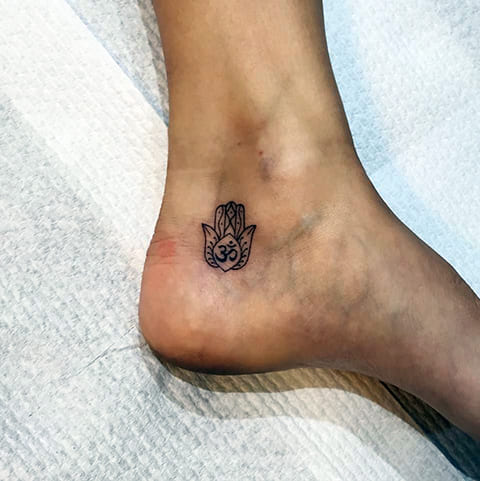 Tattoo on ankle arm Fatima girl