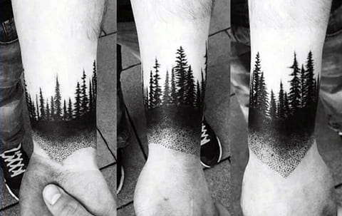Tattoo on the wrist - a forest